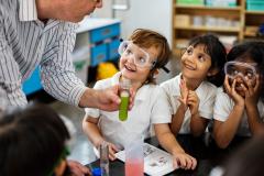 young children participate in chemistry lesson